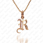 The picture shows a 14K yellow gold Koa Nani R initial pendant.