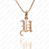 The picture shows a 14K yellow gold Koa Nani U initial pendant.