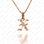 The picture shows a 14K yellow gold Koa Nani X initial pendant.