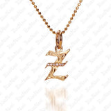 The picture shows a 14K yellow gold Koa Nani Z initial pendant.