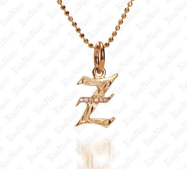The picture shows a 14K yellow gold Koa Nani Z initial pendant.