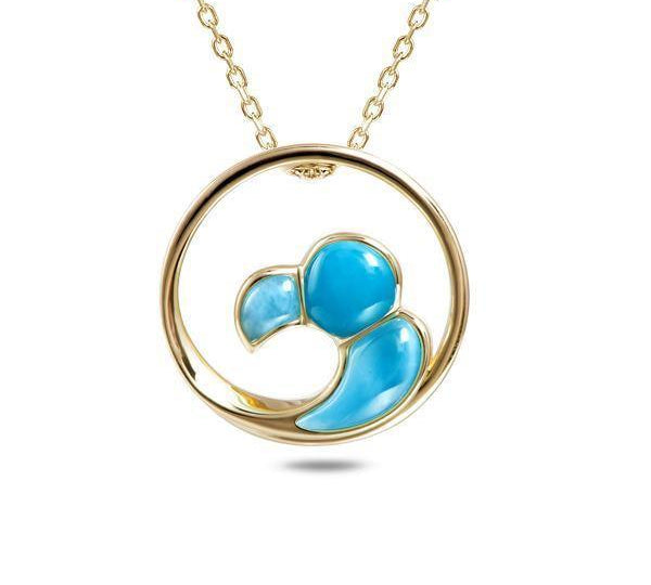 The picture shows a 14K yellow gold larimar big wave pendant.