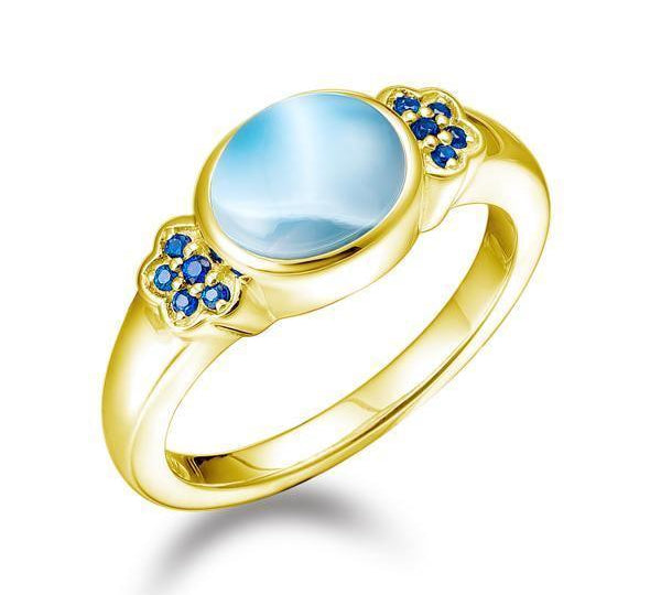 The picture shows a 14K yellow gold larimar circle ring with sapphire.