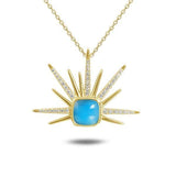 The picture shows a 14K yellow gold larimar sea urchin pendant with diamonds.