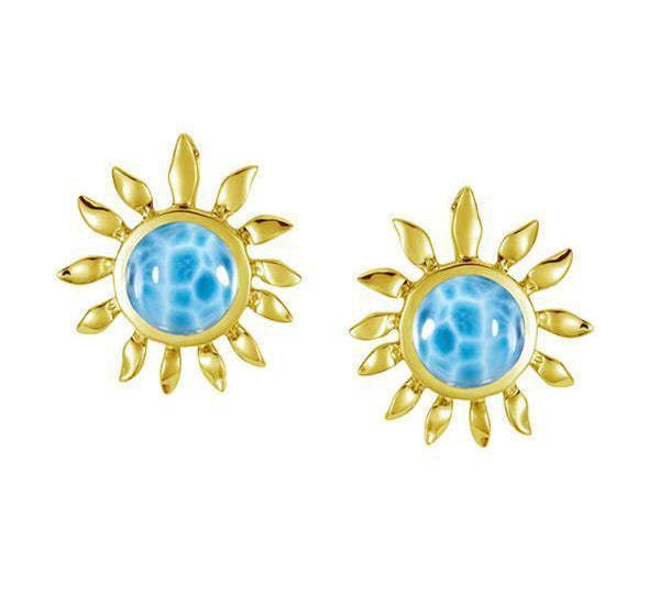 In this photo there is a pair of 14k yellow gold sunflower stud earrings with blue larimar gemstones.