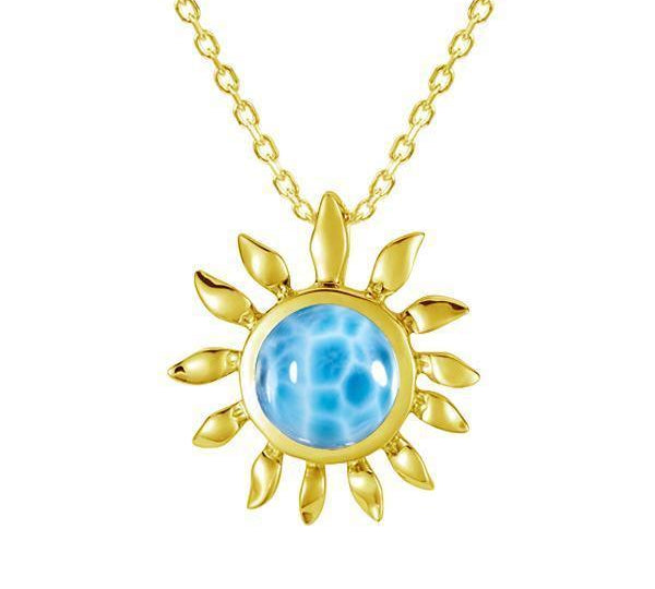 In this photo there is a yellow gold sunflower pendant with one larimar gemstone.