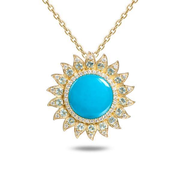 In this photo there is a yellow gold sunflower pendant with one blue larimar gemstone, diamonds and aquamarine.