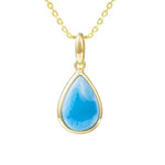 The photo shows a 14K yellow gold larimar teardrop pendant.