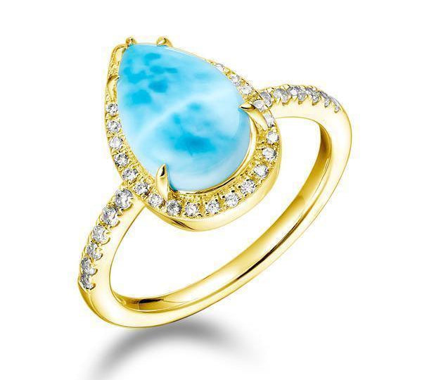The picture shows a 14K yellow gold larimar teardrop ring with diamonds.