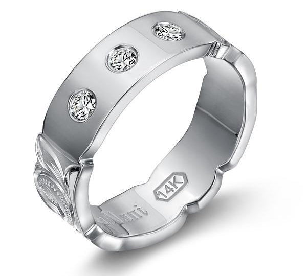 The picture shows a 14K white gold 6mm ring with hand engravings and diamonds.