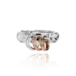 The picture shows a 14K white, yellow, and rose gold mini hoop tri-color ring.