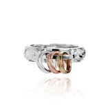 The picture shows a 14K white, yellow, and rose gold mini hoop tri-color ring.
