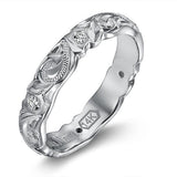 The picture shows a 4mm 14K white gold ring.