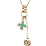 The picture shows a 14K yellow gold opal cross and heart charm pendant with hand engravings.