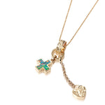 The picture shows a 14K yellow gold opal cross and heart charm pendant with hand engravings.