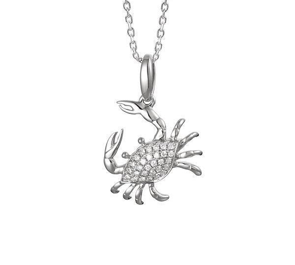 The picture shows a small 14K white gold pavé diamond blue crab pendant.