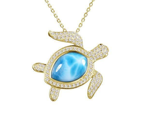The picture shows a 14K yellow gold sea turtle pendant with a larimar gemstone and diamonds.