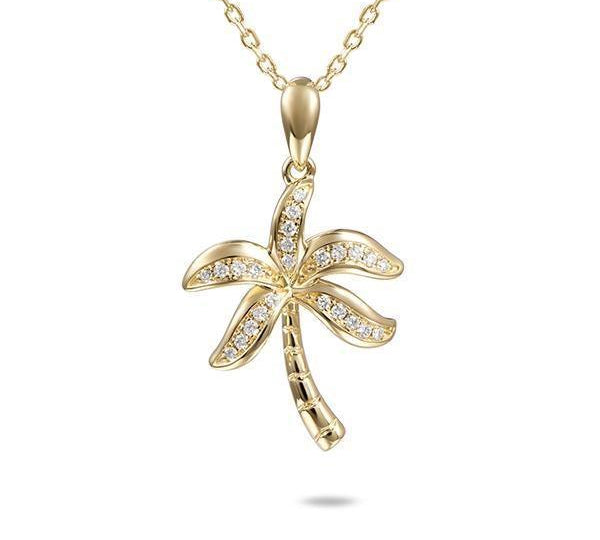 In this photo there is a yellow gold palm tree pendant with diamonds.