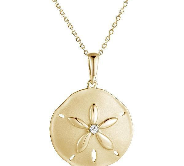 The picture shows a 14K yellow gold sand dollar pendant with a central diamond.