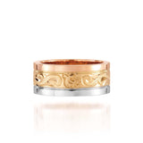 The picture shows a 14K rose, yellow, and white gold tricolor 8mm ring with hand engravings including sea turtles.