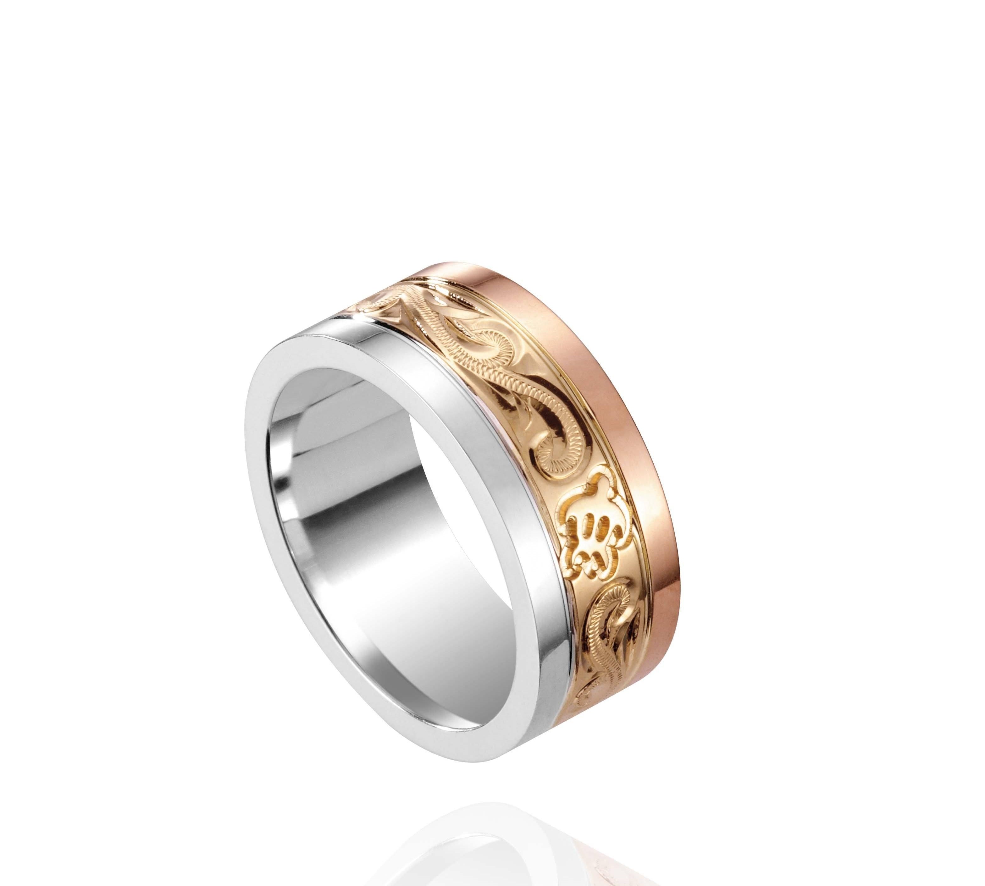 The picture shows a 14K rose, yellow, and white gold tricolor 8mm ring with hand engravings including sea turtles.