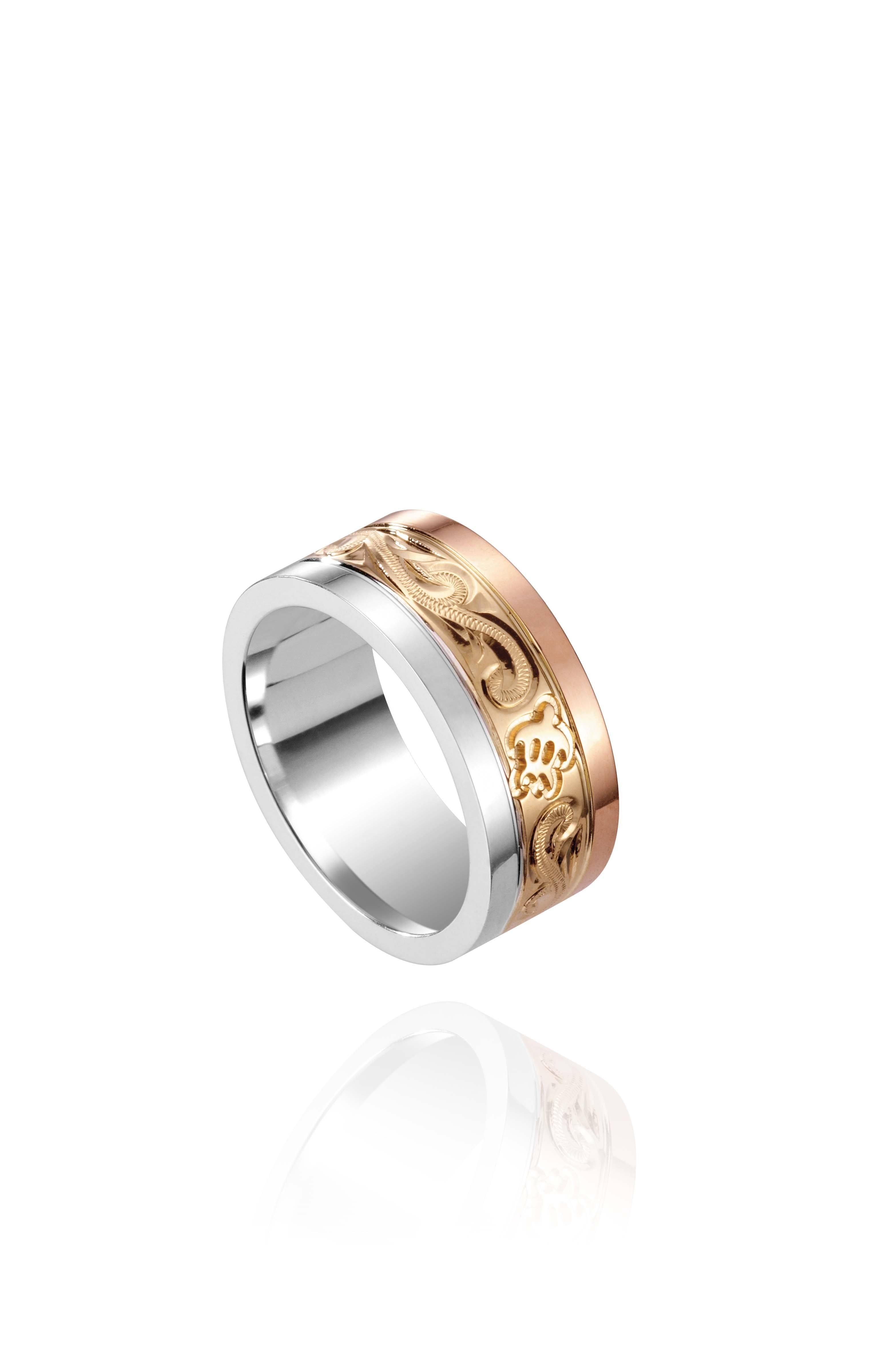 The picture shows a 14K rose, yellow, and white gold tricolor 8mm ring with hand engravings including sea turtles.