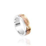 In this photo there is a yellow, rose, and white gold tricolor ring with flower and scroll hand engravings.