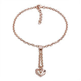 The picture shows a 14K rose gold heart bracelet with one diamond and hand-engravings.
