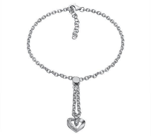 The picture shows a 14K white gold heart bracelet with one diamond and hand-engravings.