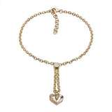 The picture shows a 14K yellow gold heart bracelet with one diamond and hand-engravings.