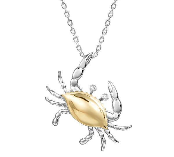 The picture shows a 14K two-tone (yellow and white gold) blue crab pendant with eye diamonds.