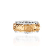 The photo shows a two-tone 8 mm 14K yellow and white gold ring with hand engravings including a sea turtle.