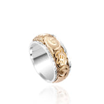 The photo shows a two-tone 8 mm 14K yellow and white gold ring with hand engravings including a sea turtle.