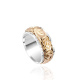 The photo shows a two-tone 8 mm 14K yellow and white gold ring with hand engravings including a sea turtle.
