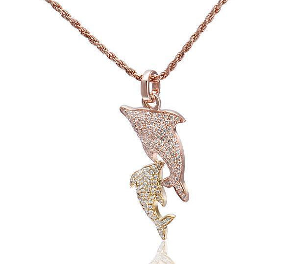 The picture shows a 14K rose and yellow gold two-tone 2 dolphin pendant with diamonds.