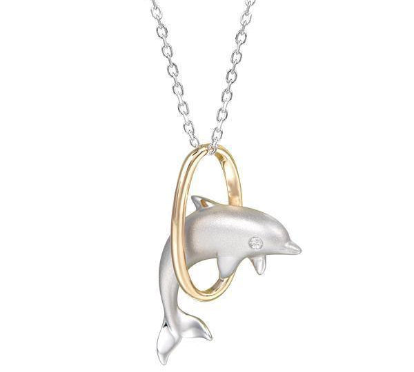 The picture shows a 14K yellow and white gold dolphin pendant with one diamond.