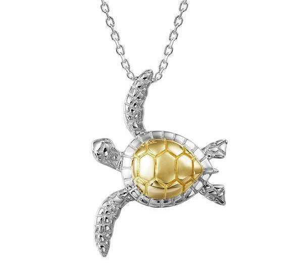 The picture shows a 14K yellow and white gold sea turtle pendant with two diamonds.