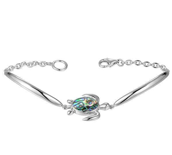 Sterling silver sea turtle bracelet, detailed with an abalone shell. 