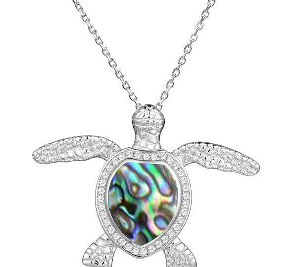 Sterling silver sea turtle pendant, featuring Pave detail and an abalone shell. 
