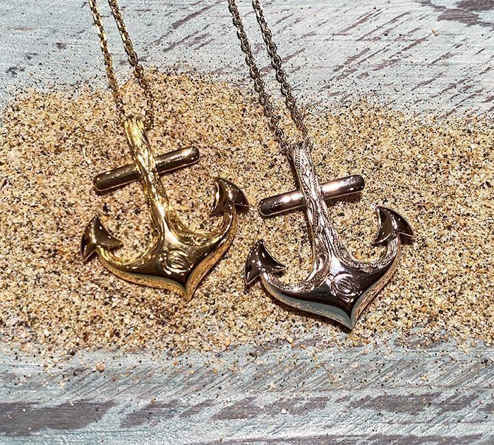 14k white gold anchor pendant featuring a hand-engraved sea turtle design