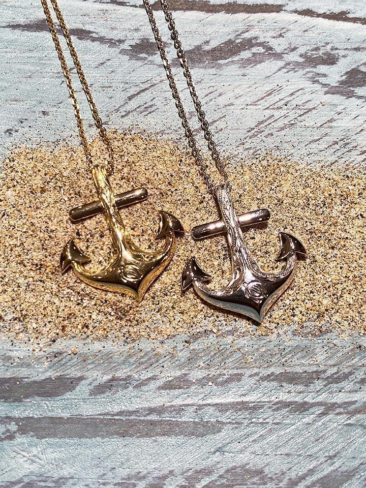 14k white gold anchor pendant featuring a hand-engraved sea turtle design