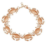 The picture shows a 925 sterling silver rose gold-plated blue crab bracelet.