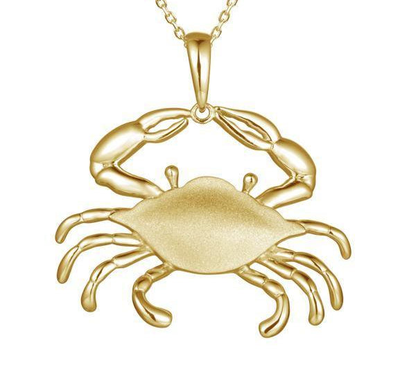 The picture shows a 925 sterling silver, yellow gold vermeil crab pendant.