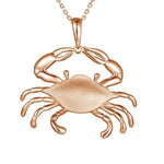 The picture shows a 925 sterling silver, rose gold vermeil crab pendant.