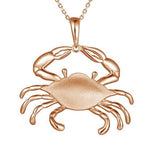 The picture shows a 925 sterling silver, rose gold vermeil crab pendant.