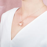 The picture shows a 925 sterling silver, rose gold vermeil crab pendant.