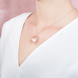 The picture shows a 925 sterling silver, rose gold vermeil crab pendant.