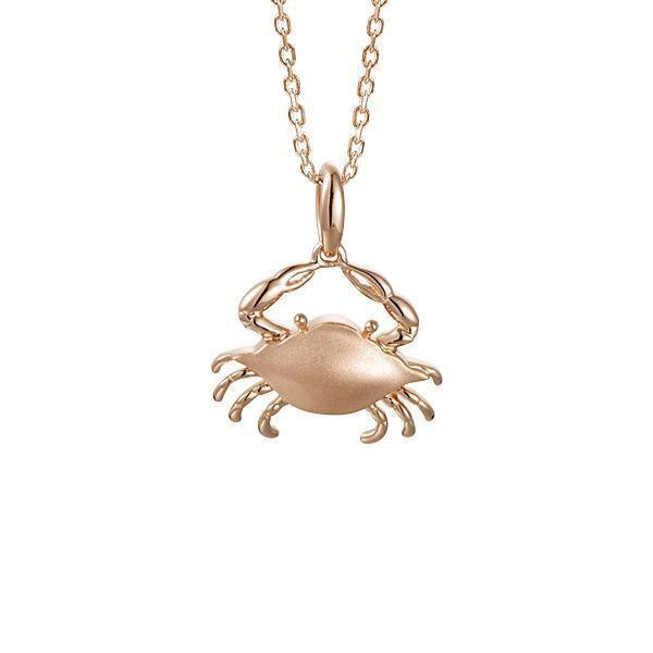 The picture shows a 14K rose gold blue crab pendant.