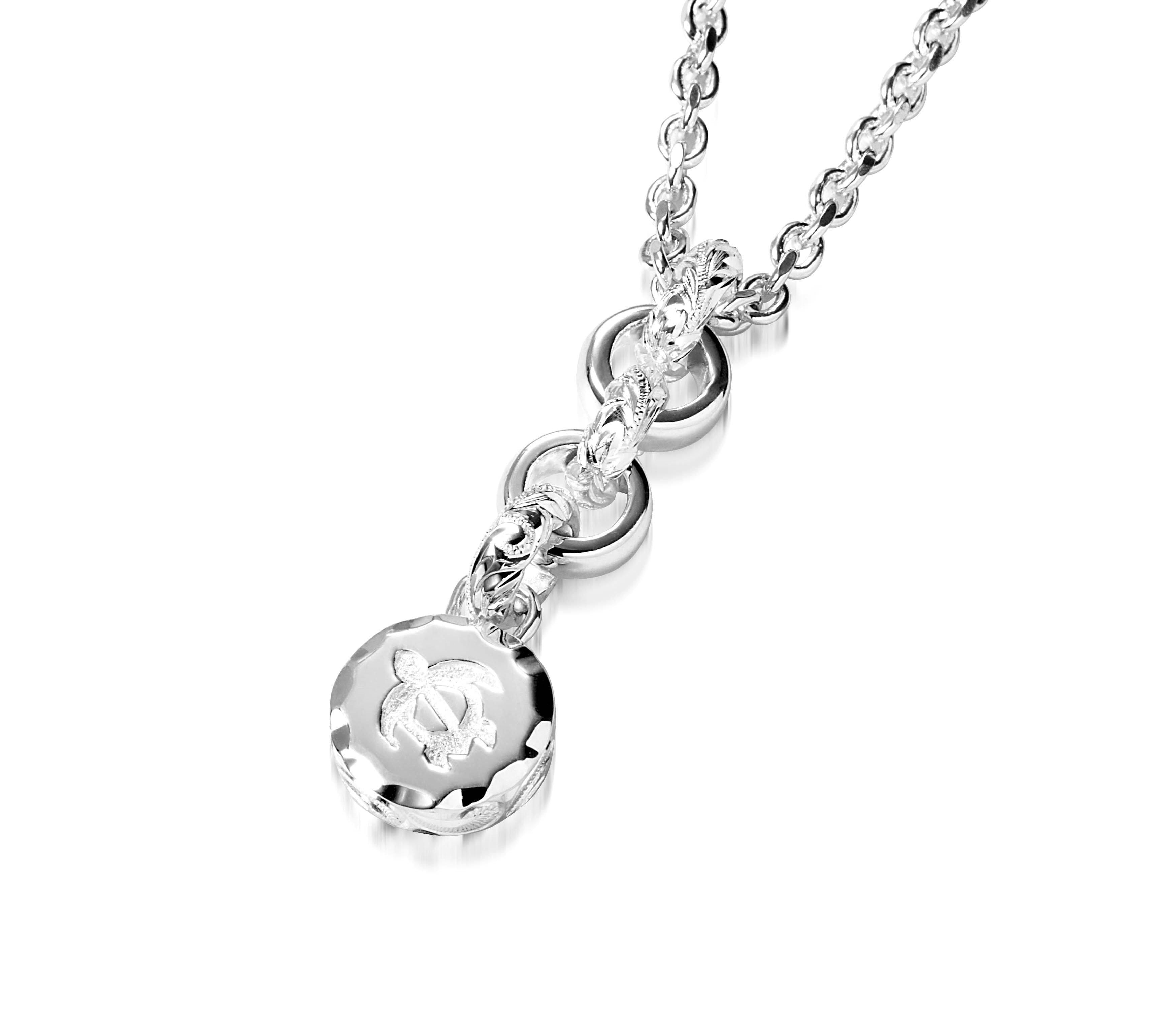 The picture shows a 925 sterling silver petroglyph pendant with a sea turtle engraving.