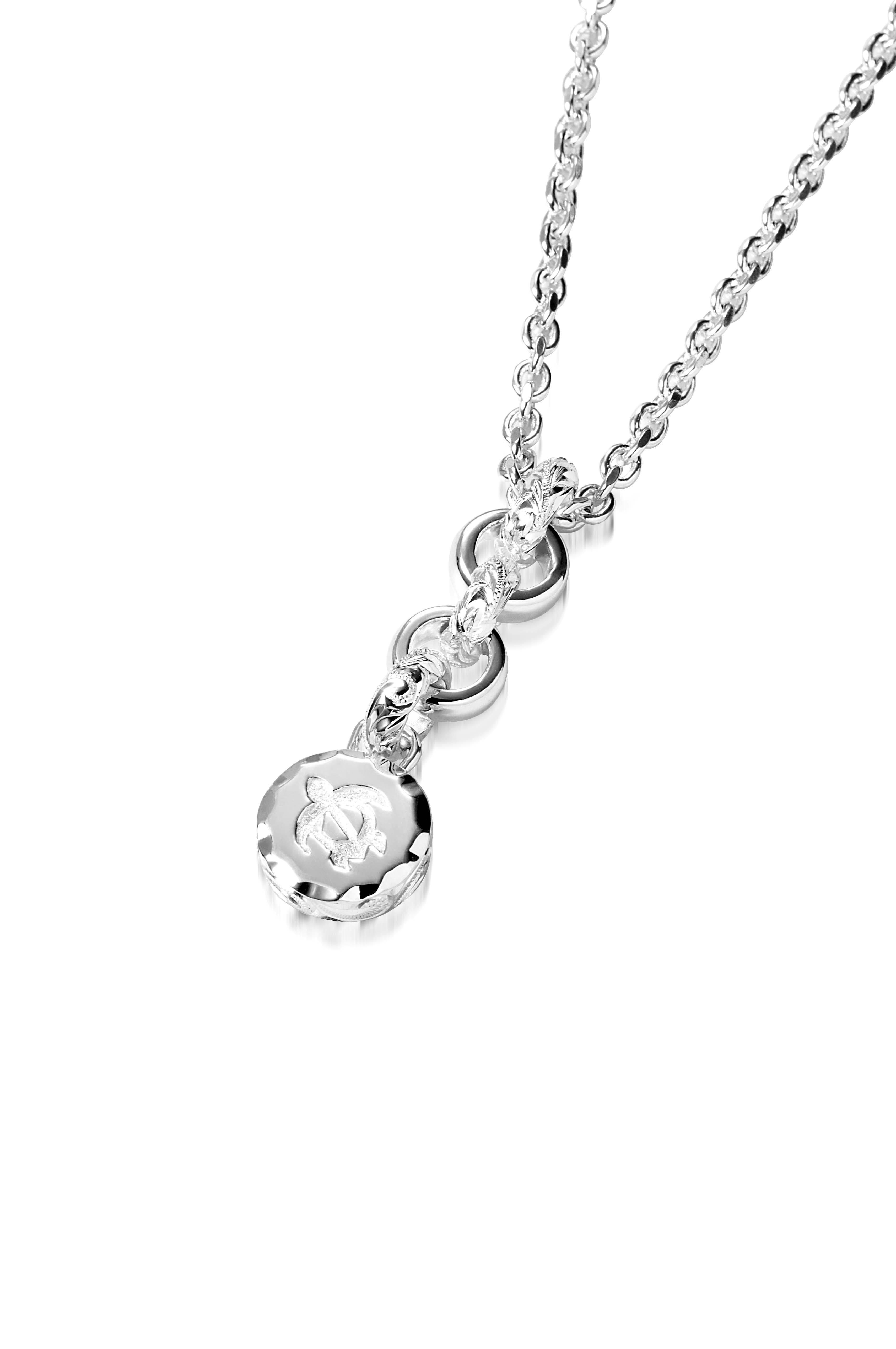 The picture shows a 925 sterling silver petroglyph pendant with a sea turtle engraving.